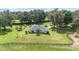 Aerial view of the property showcasing the house and expansive land at 7137 & 7141 S Magnolia Ave, Ocala, FL 34476