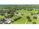 Aerial view of expansive property with multiple homes and lush green pastures at 7137 & 7141 S Magnolia Ave, Ocala, FL 34476