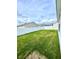 Fenced backyard with grassy lawn at 892 Nash Loop, The Villages, FL 32162