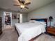 Spacious main bedroom with large bed and walk-in closet at 1436 Ne 161St Pl, Citra, FL 32113