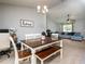 Dining area with table and chairs, view of living room and backyard at 1436 Ne 161St Pl, Citra, FL 32113