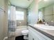 Clean bathroom with bathtub, toilet, and updated vanity at 1436 Ne 161St Pl, Citra, FL 32113