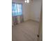 Bright bedroom with light wood flooring and window coverings at 10886 Sw 87Th Ct, Ocala, FL 34481