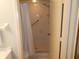 Clean bathroom with shower stall and grab bar at 10886 Sw 87Th Ct, Ocala, FL 34481