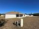 Newly built home exterior showcasing a covered patio at 13 Ash Rd, Ocala, FL 34472