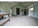 Spacious workshop with workbench and open doors at 1750 Ne 180Th St, Citra, FL 32113