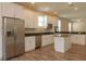 Modern kitchen with white cabinets and a kitchen island at 0 Fisher Lane Way, Ocklawaha, FL 32179
