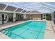 Inviting screened-in pool with spacious lanai at 5851 Sw 86Th Pl, Ocala, FL 34476