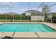 Relaxing screened-in pool with backyard shed at 5851 Sw 86Th Pl, Ocala, FL 34476