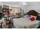 Large bedroom with a queen-size bed and lots of storage at 5851 Sw 86Th Pl, Ocala, FL 34476