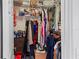 Large walk-in closet with plenty of shelving and hanging space at 5851 Sw 86Th Pl, Ocala, FL 34476