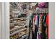 Well-organized closet with shoe shelves and hanging rods at 5851 Sw 86Th Pl, Ocala, FL 34476