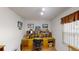 Spacious home office with a large desk and ample storage at 8420 Sw 92Nd St # B, Ocala, FL 34481
