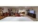 Bright living room features hardwood floors and a view into an adjacent room at 8420 Sw 92Nd St # B, Ocala, FL 34481