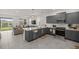 Modern kitchen with gray cabinets, white countertops, and stainless steel appliances at 7288 Sw 64Th Street Rd, Ocala, FL 34474