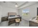 Spacious main bedroom with a large bed and plenty of natural light at 7288 Sw 64Th Street Rd, Ocala, FL 34474