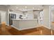 Modern kitchen with stainless steel appliances and an island at 1989 Nw 111Th Loop, Ocala, FL 34475