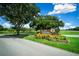 Ocala Downs entrance with stone signage and landscaping at 1989 Nw 111Th Loop, Ocala, FL 34475