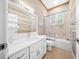 Bathroom features vanity with quartz countertop and tub at 1989 Nw 111Th Loop, Ocala, FL 34475