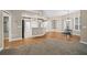 Kitchen dining area with hardwood floors and access to other rooms at 1989 Nw 111Th Loop, Ocala, FL 34475