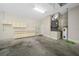 Garage workshop with cabinets and a water heater at 1989 Nw 111Th Loop, Ocala, FL 34475