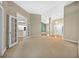 Spacious living room with carpet and access to other rooms at 1989 Nw 111Th Loop, Ocala, FL 34475