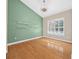 Bright office with hardwood floors and built-in shelves at 1989 Nw 111Th Loop, Ocala, FL 34475