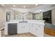 Modern kitchen with white cabinets and marble countertops at 1989 Nw 111Th Loop, Ocala, FL 34475
