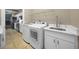 Laundry room with washer, dryer, and a quartz countertop at 1989 Nw 111Th Loop, Ocala, FL 34475