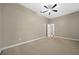 Spacious bedroom with carpeted floor and ceiling fan at 1989 Nw 111Th Loop, Ocala, FL 34475