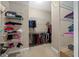 Large walk-in closet with ample shelving and hanging space at 1989 Nw 111Th Loop, Ocala, FL 34475