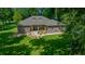 One-story home nestled among large trees on a spacious lot at 1989 Nw 111Th Loop, Ocala, FL 34475