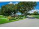 Ocala Downs entrance with stone signage and landscaping at 1989 Nw 111Th Loop, Ocala, FL 34475