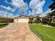 Attractive single-story house with a landscaped yard and driveway at 16376 Sw 13Th Ter, Ocala, FL 34473