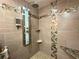 Modern shower with rainfall shower head and tile accents at 16376 Sw 13Th Ter, Ocala, FL 34473