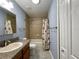 Clean bathroom with tub/shower, vanity and tile flooring at 16376 Sw 13Th Ter, Ocala, FL 34473