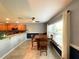 Cozy dining area with wood table and chairs, near kitchen at 16376 Sw 13Th Ter, Ocala, FL 34473