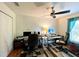 Home office space with two work stations and ceiling fan at 16376 Sw 13Th Ter, Ocala, FL 34473