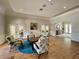 Community clubhouse lobby with comfortable seating and hardwood floors at 16376 Sw 13Th Ter, Ocala, FL 34473