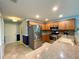 Modern kitchen with stainless steel appliances at 16376 Sw 13Th Ter, Ocala, FL 34473