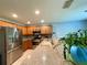 Clean kitchen with stainless steel appliances and granite countertops at 16376 Sw 13Th Ter, Ocala, FL 34473
