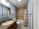 Clean bathroom with tub/shower, vanity and tile flooring at 16376 Sw 13Th Ter, Ocala, FL 34473