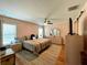 Spacious bedroom with king-size bed and wood floors at 16376 Sw 13Th Ter, Ocala, FL 34473