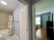 Full bathroom with tub shower combo and nautical decor at 16376 Sw 13Th Ter, Ocala, FL 34473
