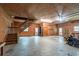 Spacious garage interior with stairs to upper level at 7545 Ne 58Th Ave, Anthony, FL 32617