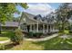 Two-story house with a large front porch at 7545 Ne 58Th Ave, Anthony, FL 32617