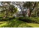 Two-story home with large yard and mature trees at 7545 Ne 58Th Ave, Anthony, FL 32617