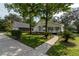 Two-story home with detached garage and paved driveway at 7545 Ne 58Th Ave, Anthony, FL 32617