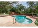 Relaxing kidney-shaped pool with brick deck at 7545 Ne 58Th Ave, Anthony, FL 32617