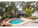 Charming home with a kidney-shaped pool and gazebo at 7545 Ne 58Th Ave, Anthony, FL 32617